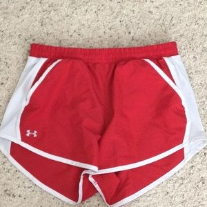 Red and white under armour athletic shorts